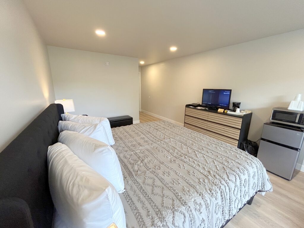 King suite room with mountain decor at RiverGate Lodge